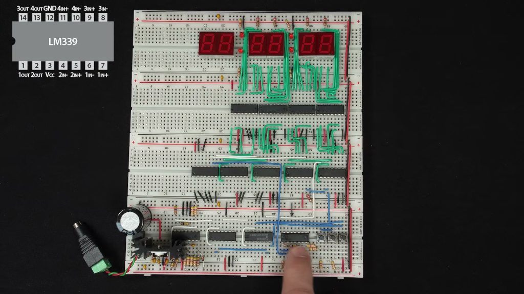 Ben Eater demonstrating the breadboard clock and its time-setting buttons