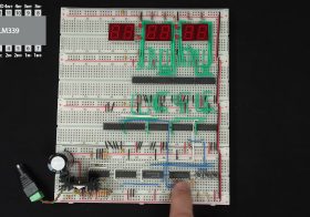 Ben Eater adds time-setting controls to his breadboard clock