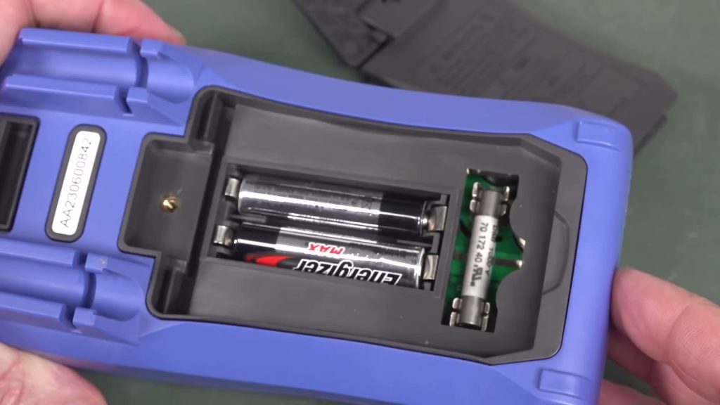 Hioki DT4215 battery compartment and fuse shown in EEVblog’s teardown