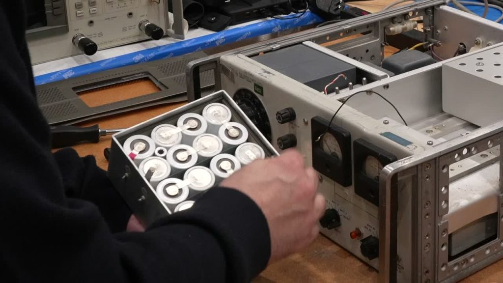 Opened HP K02-5060 standby power supply and components on CuriousMarc’s repair bench