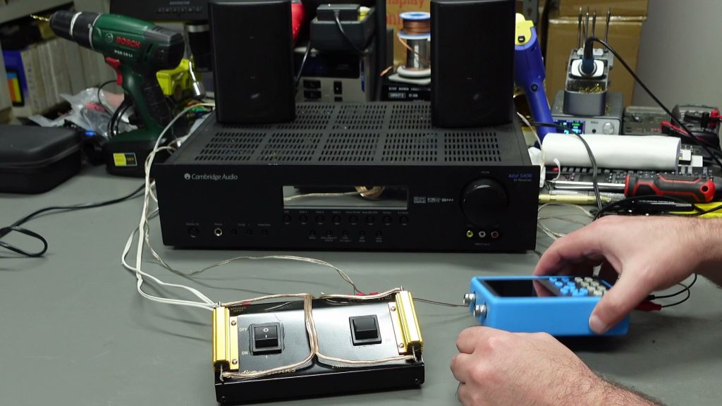 Homemade resistor dummy load and speaker switch in front of a Cambridge Audio receiver